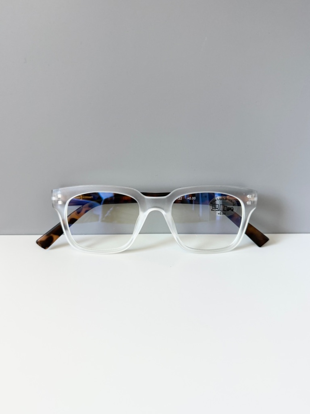 AJ Morgan ASOS clear frame blue light glasses with tortoiseshell temples
